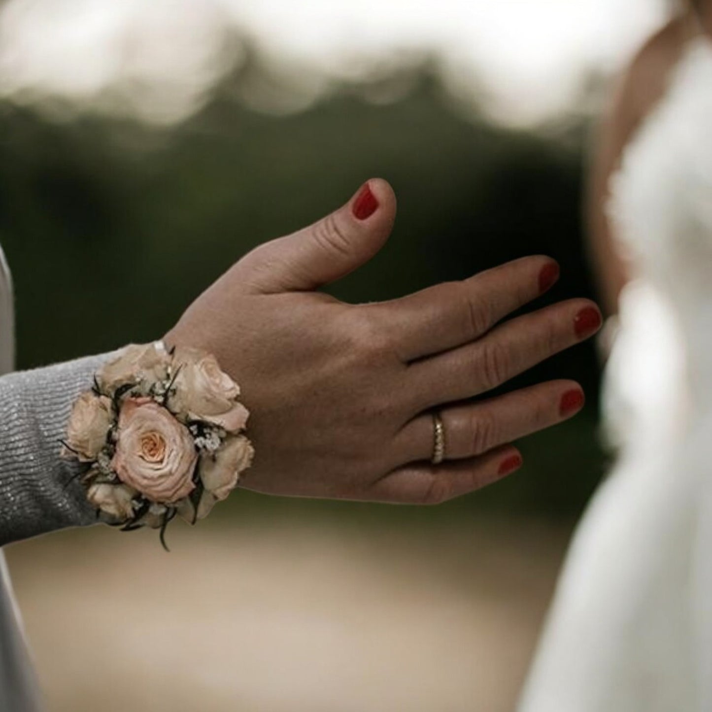 <tc>Coral Floral Corsage</tc>